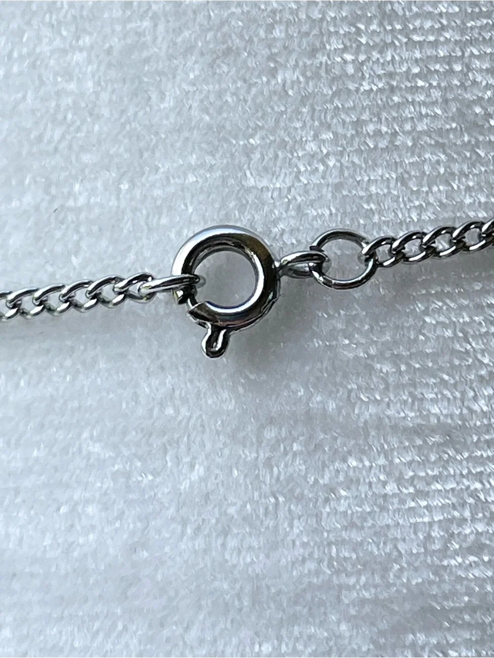 Minnie Mouse shaker charm on silver chain.